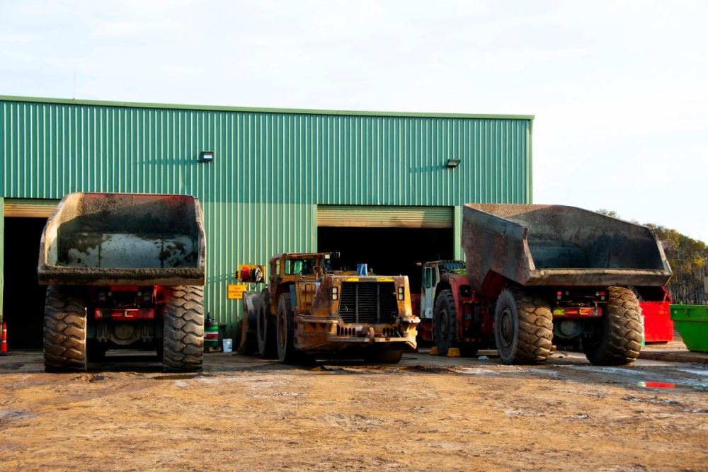 Workshop with off-road heavy vehicles.